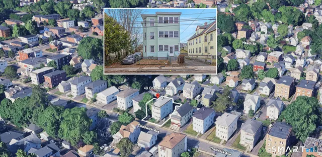 view of building with an outdoor space