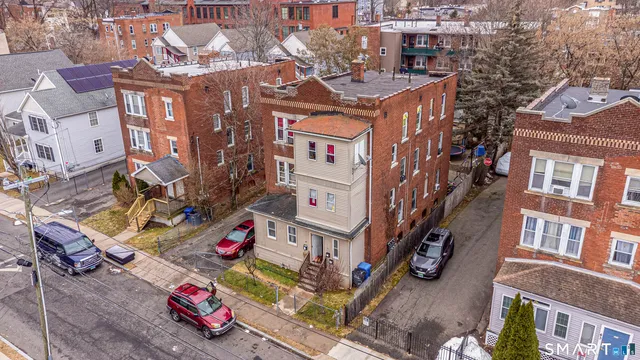 an aerial view of multi story residential apartment building