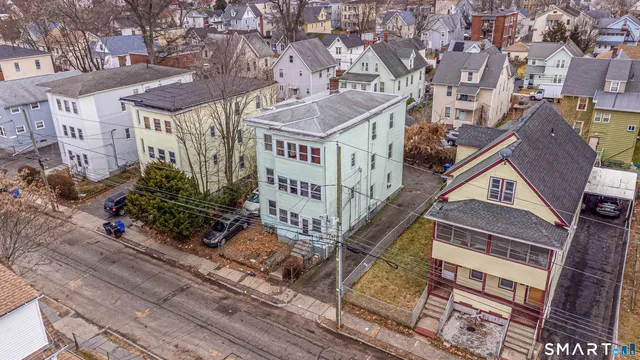 an aerial view of a house with a garden