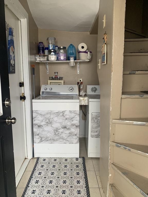 149 Smith Street Fall River, MA 02721 - Photo 31 of 38 a view of kitchen with refrigerator and cabinets