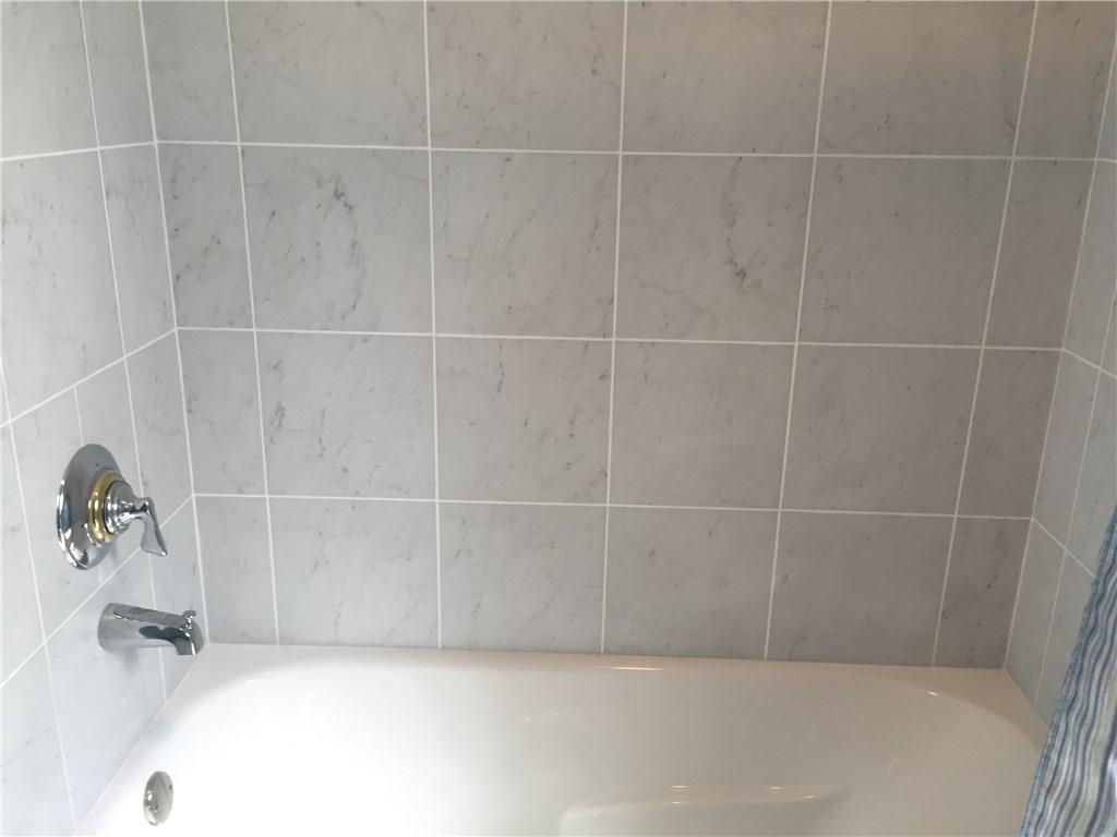 401 Lowber Road Lowber, PA 15660 - Photo 10 of 15 New tub, faucet/shower head, tub surround in marble/surround
