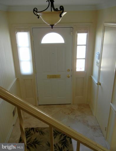 8413 Riverside Road Alexandria, VA 22308 - Photo 19 of 28 a view of a hallway with a window
