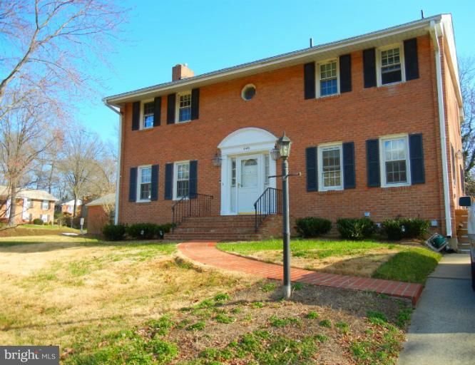 8413 Riverside Road Alexandria, VA 22308 - Photo 25 of 28 a front view of a house with a yard