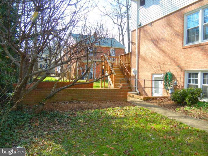 8413 Riverside Road Alexandria, VA 22308 - Photo 26 of 28 a backyard of a house with lots of green space