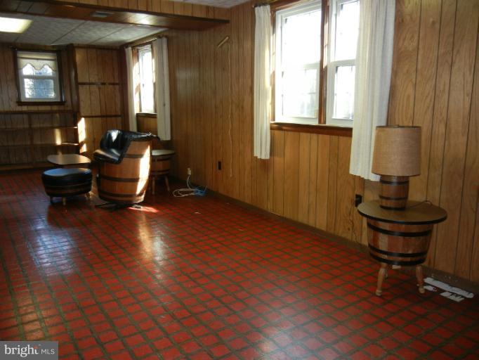 8413 Riverside Road Alexandria, VA 22308 - Photo 5 of 28 a living room with furniture and wooden floor