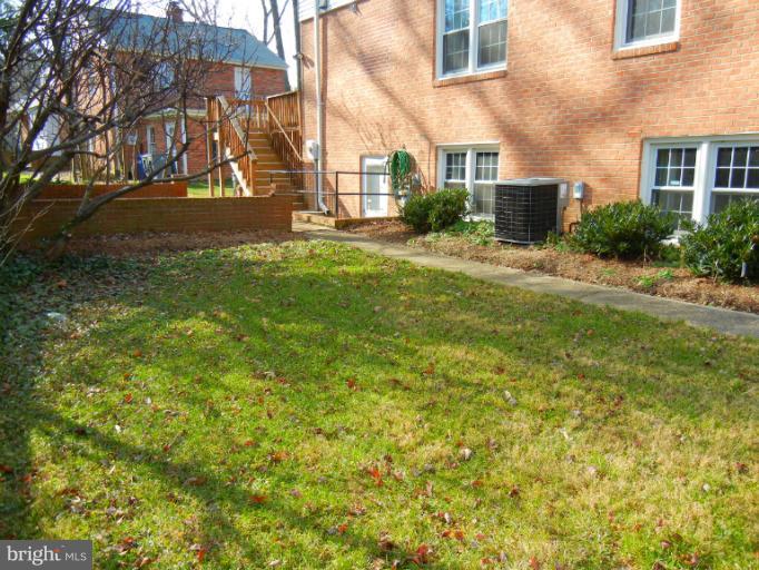 8413 Riverside Road Alexandria, VA 22308 - Photo 7 of 28 a view of yard in front of building