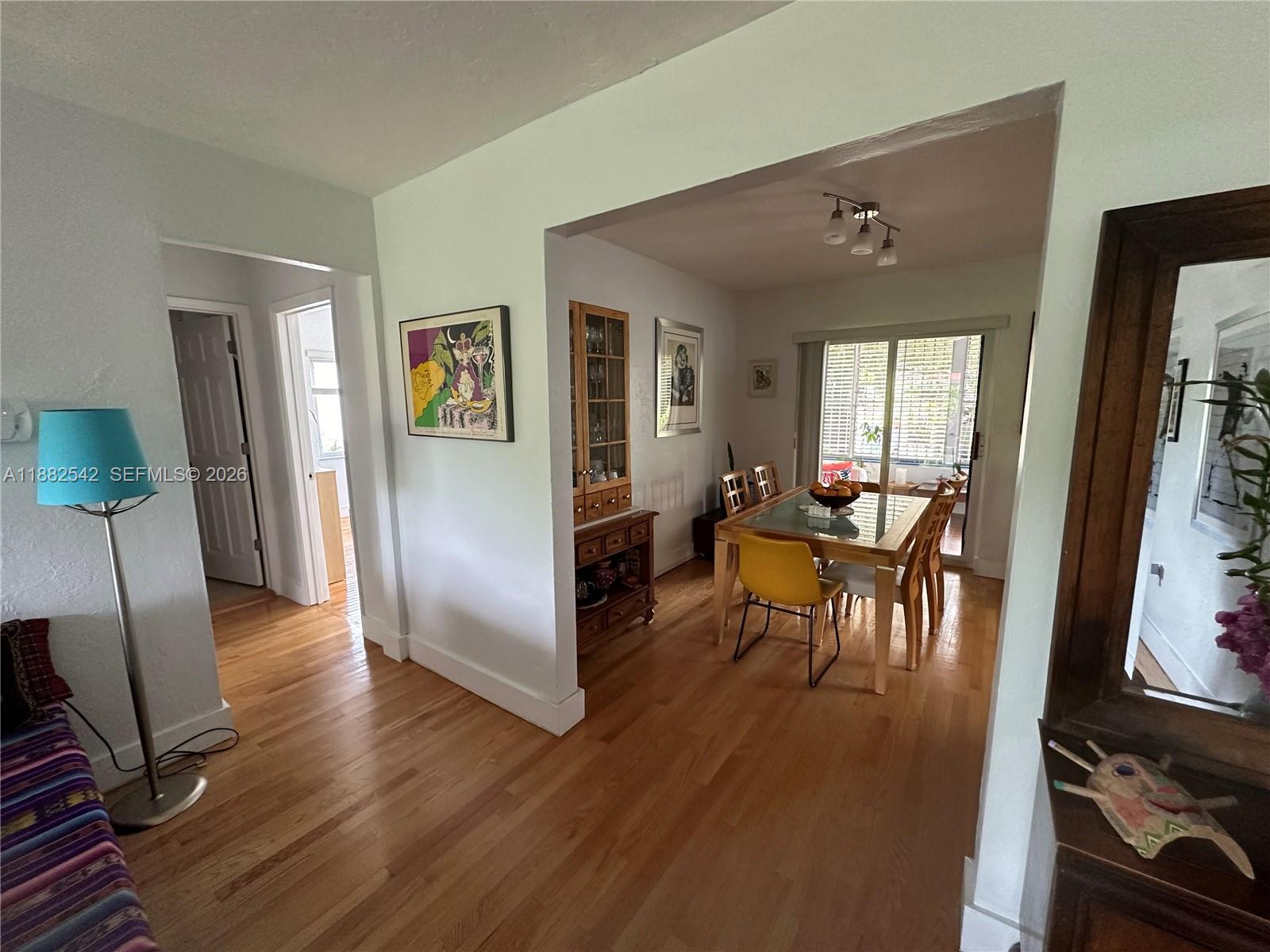 2270 Southwest 24th Street Miami, FL 33145 - Photo 7 of 35 a view of a livingroom with furniture and a flat screen tv