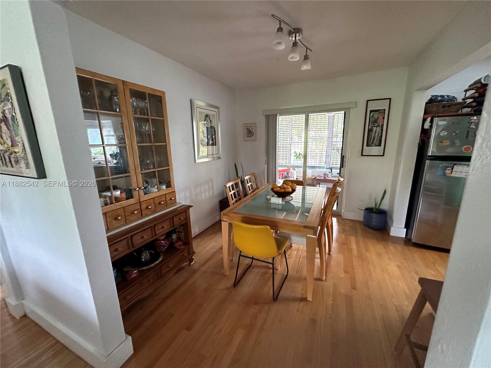 2270 Southwest 24th Street Miami, FL 33145 - Photo 9 of 35 a living room with furniture and a window