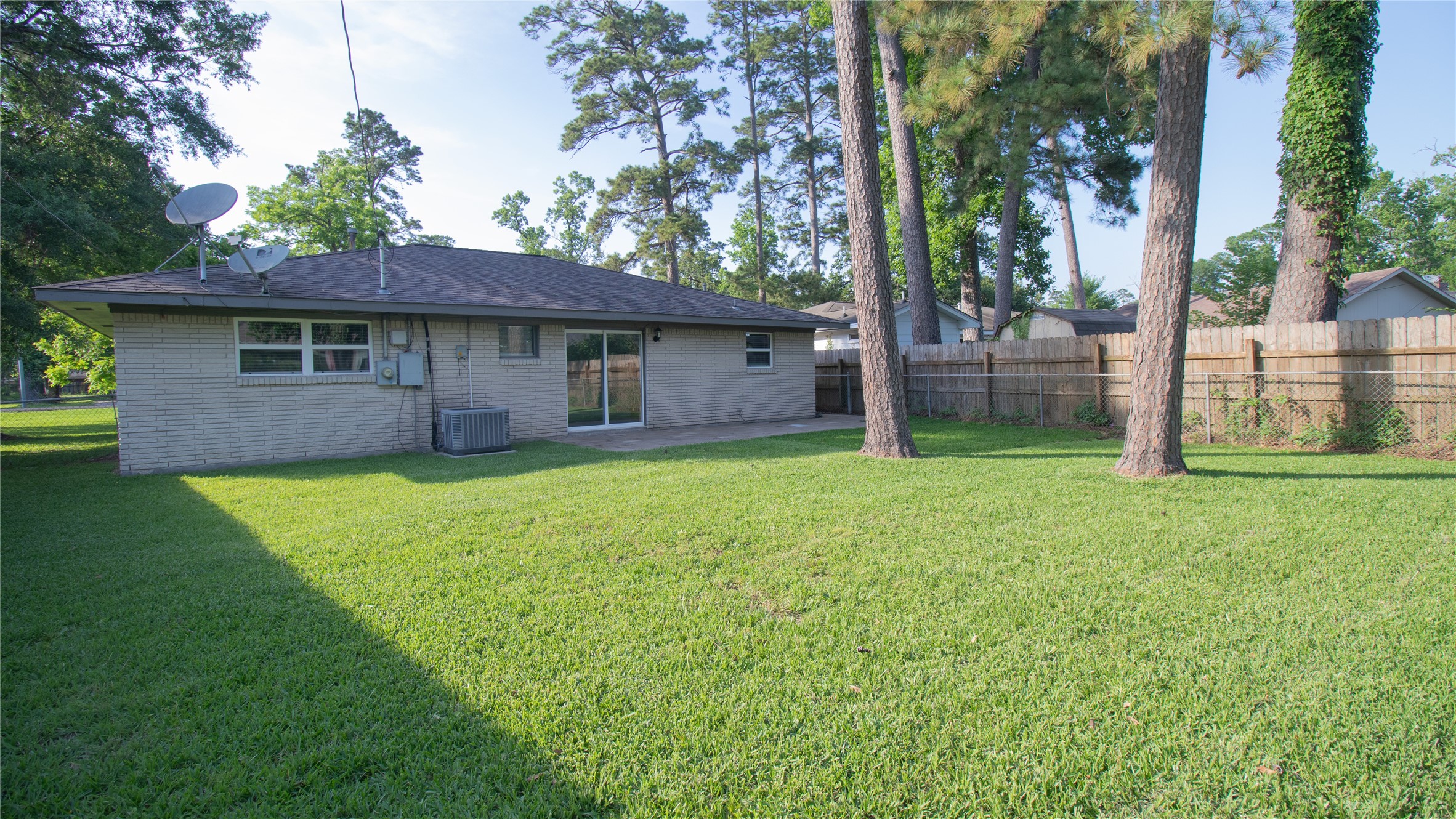 322 Broad Ripple Drive Houston, TX 77336 - Photo 14 of 16 Backyard featuring a comfortable patio area, perfect for outdoor relaxation and entertaining. This space offers an excellent opportunity for enjoying the fresh air and creating lasting memories.