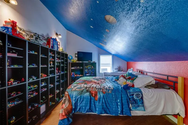 a view of a chairs and table in a room