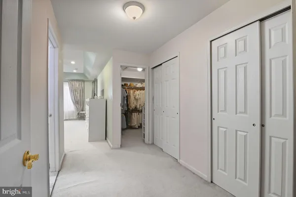 a bathroom with a shower a toilet and a sink