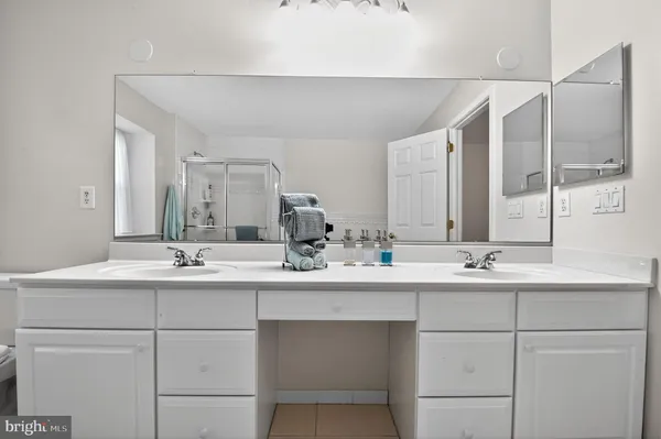 a view of a chairs and table in a patio