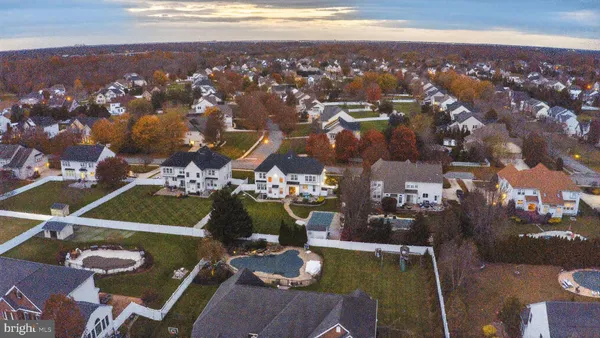 a view of swimming pool with outdoor seating