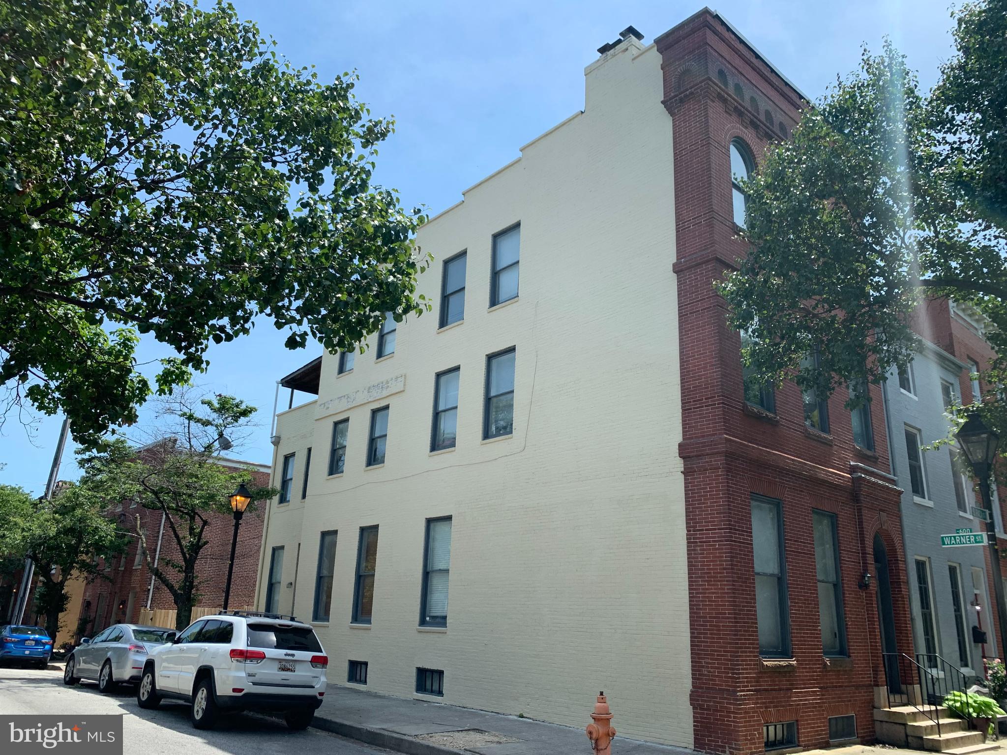 601 South Paca Street Baltimore, MD 21230 - Photo 4 of 16 brick has been pointed and painted