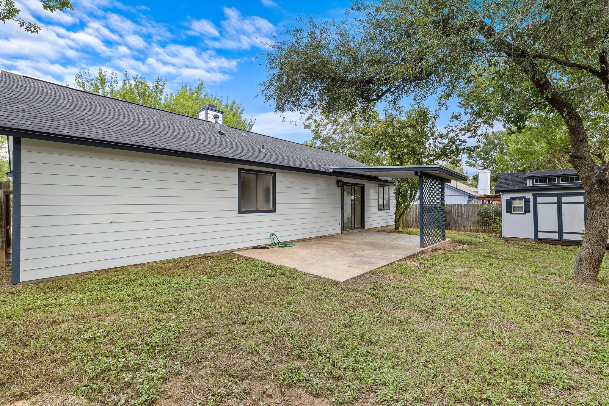 1705 Laurel Path Round Rock, TX 78664 - Photo 16 of 17 Flat backyard with storage shed.