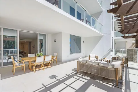 a bathroom with a bathtub and double sink