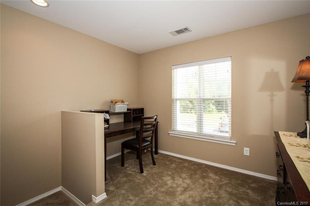 219 River Clay Road Fort Mill, SC 29708 - Photo 17 of 24 a view of a workspace with furniture and a window