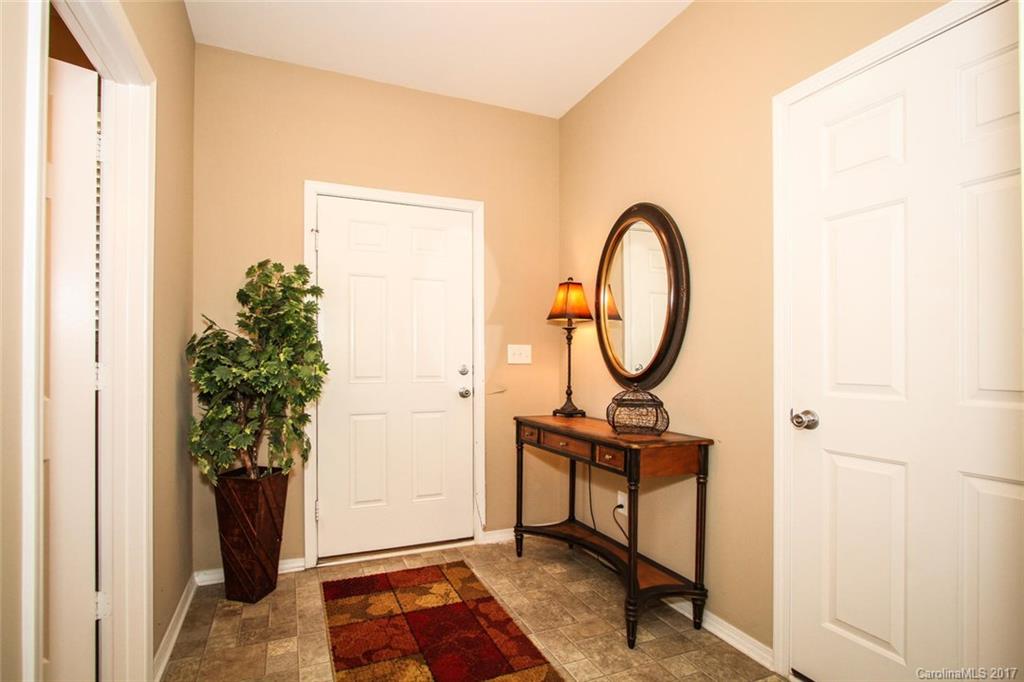 219 River Clay Road Fort Mill, SC 29708 - Photo 3 of 24 a view of a room with a sink and a mirror