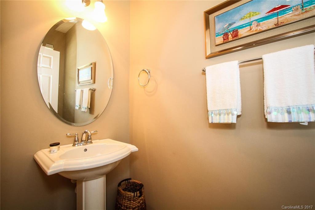 219 River Clay Road Fort Mill, SC 29708 - Photo 4 of 24 a bathroom with a sink and a mirror