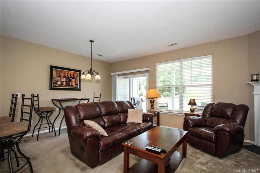 219 River Clay Road Fort Mill, SC 29708 - Photo 10 of 24 a living room with furniture and a large window