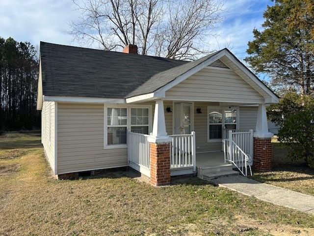 a front view of a house with porch