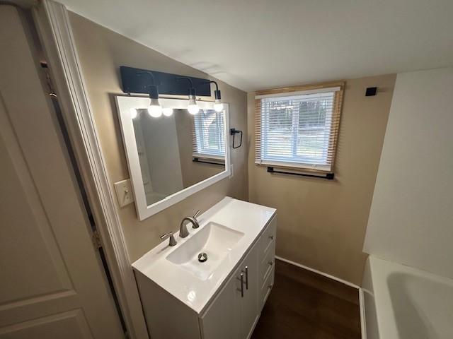 714 Blount Street Smithfield, NC 27577 - Photo 11 of 13 a bathroom with a sink toilet and mirror
