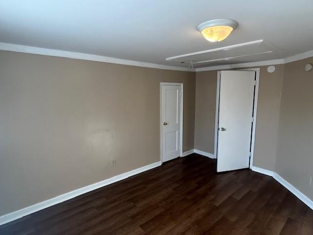 714 Blount Street Smithfield, NC 27577 - Photo 9 of 13 a view of an empty room with a window and wooden floor
