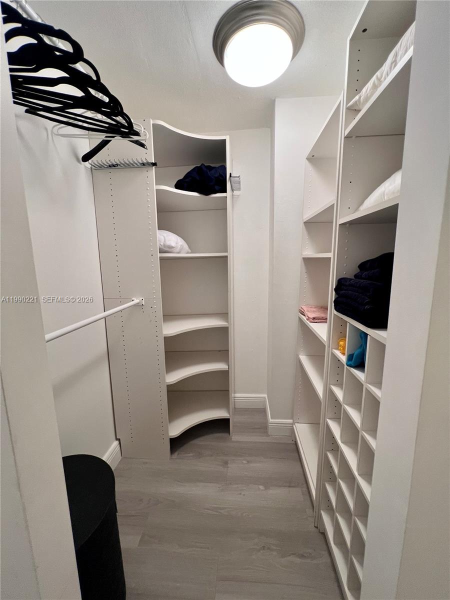 8233 Harding Avenue, Unit 204 Miami Beach, FL 33141 - Photo 13 of 18 a view of walk in closet