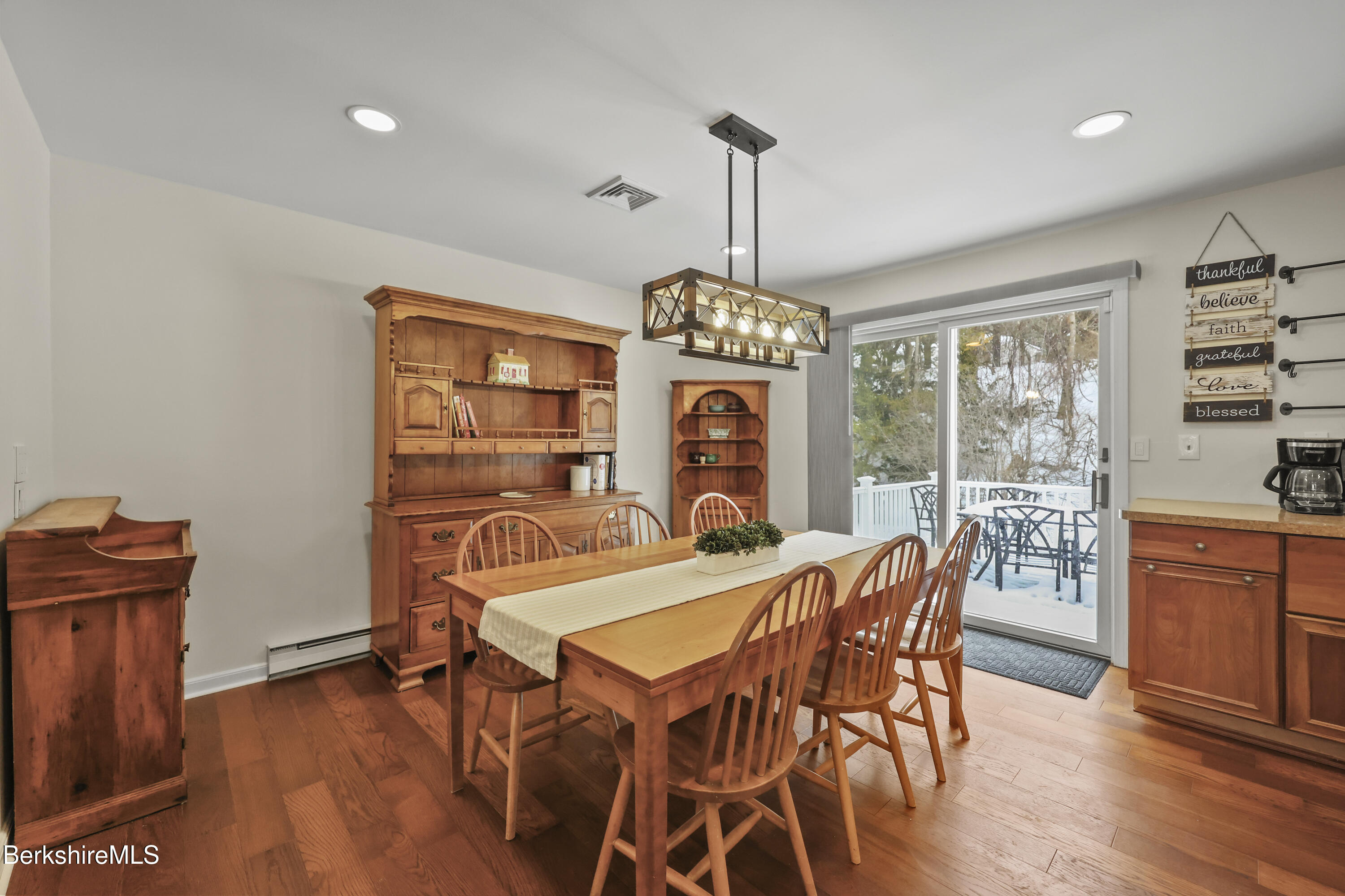 83 Alfred Drive Pittsfield, MA 01201 - Photo 13 of 49 a view of a dining room with furniture window and wooden floor