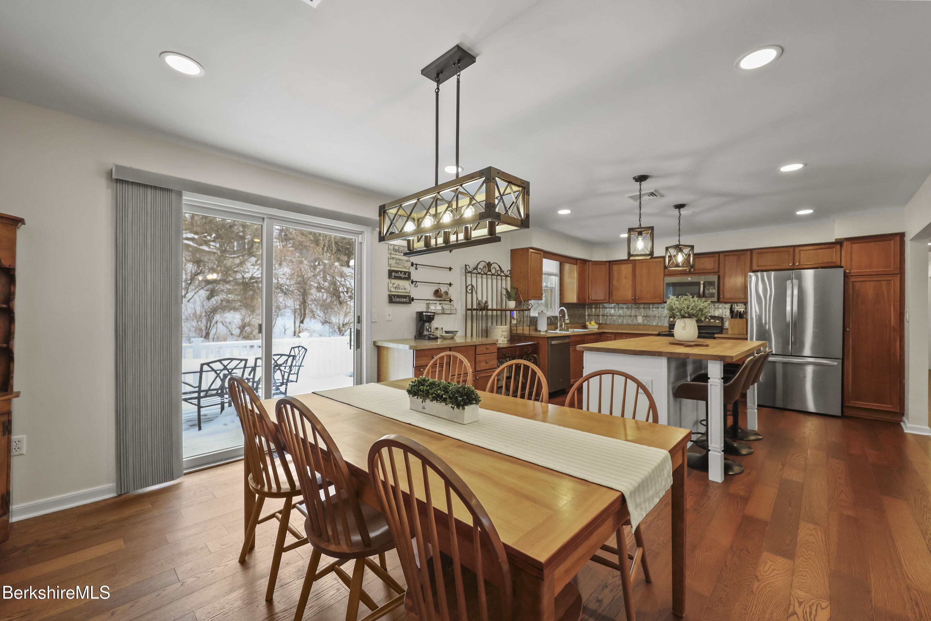83 Alfred Drive Pittsfield, MA 01201 - Photo 16 of 49 a view of a dining room with furniture window and wooden floor