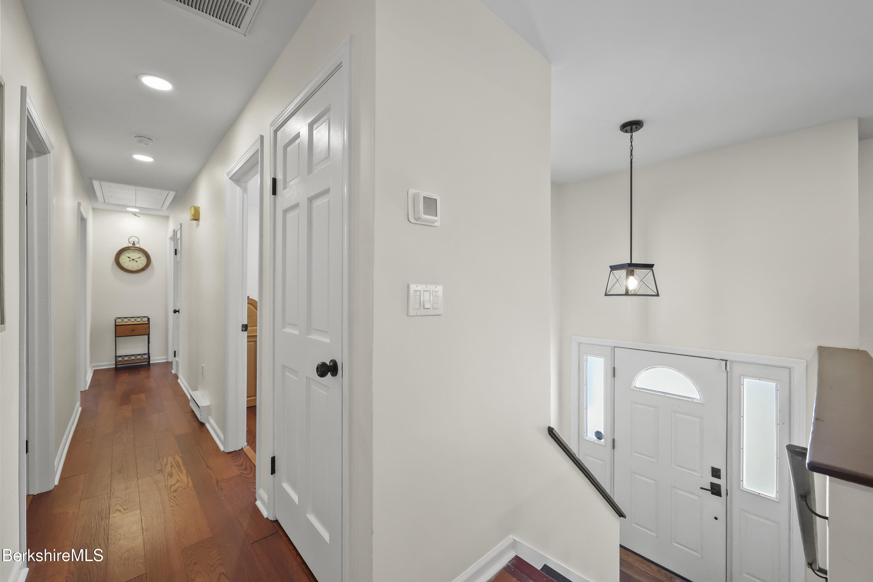 83 Alfred Drive Pittsfield, MA 01201 - Photo 18 of 49 a view of a hallway with wooden floor