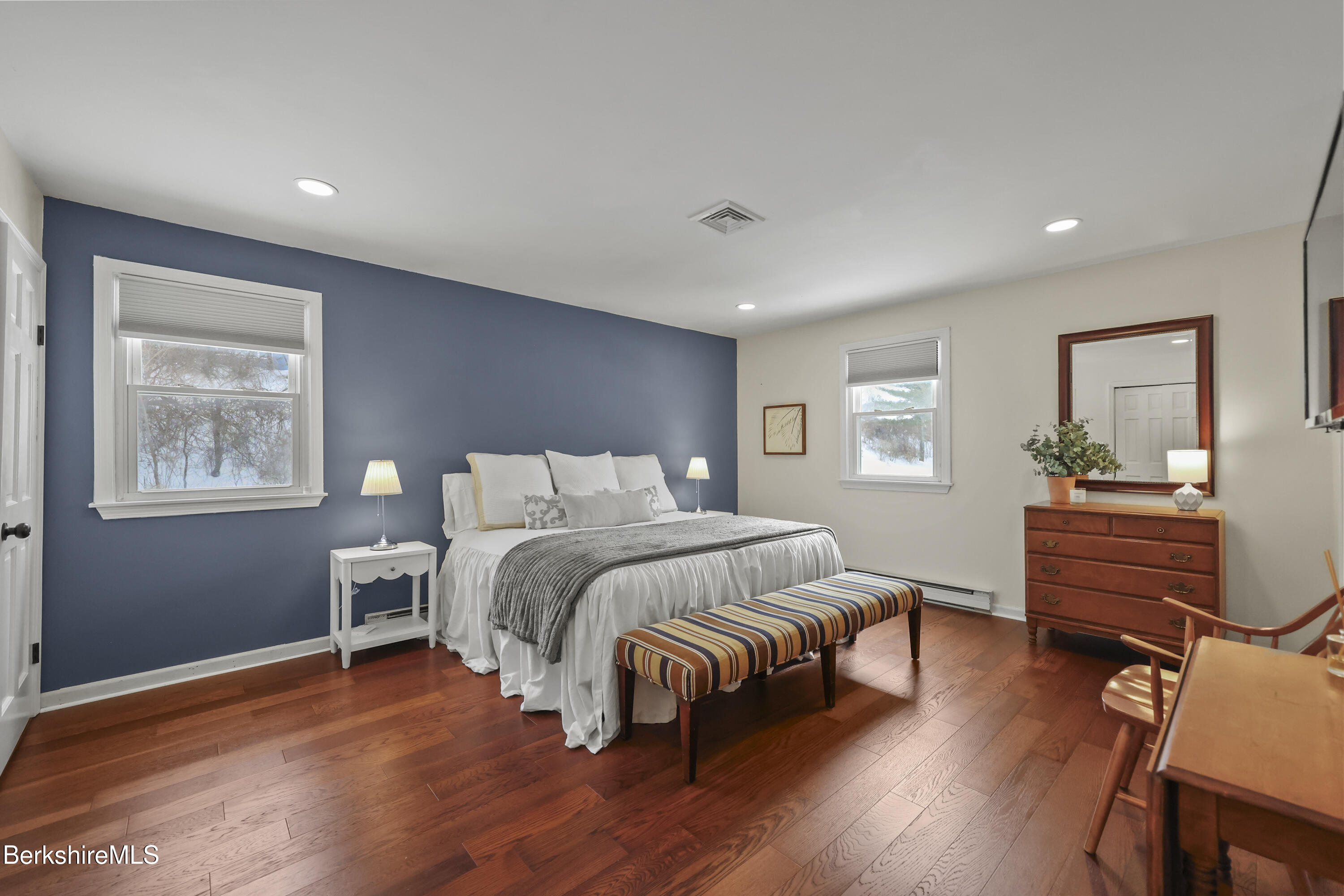 83 Alfred Drive Pittsfield, MA 01201 - Photo 19 of 49 a bedroom with a bed and wooden floor