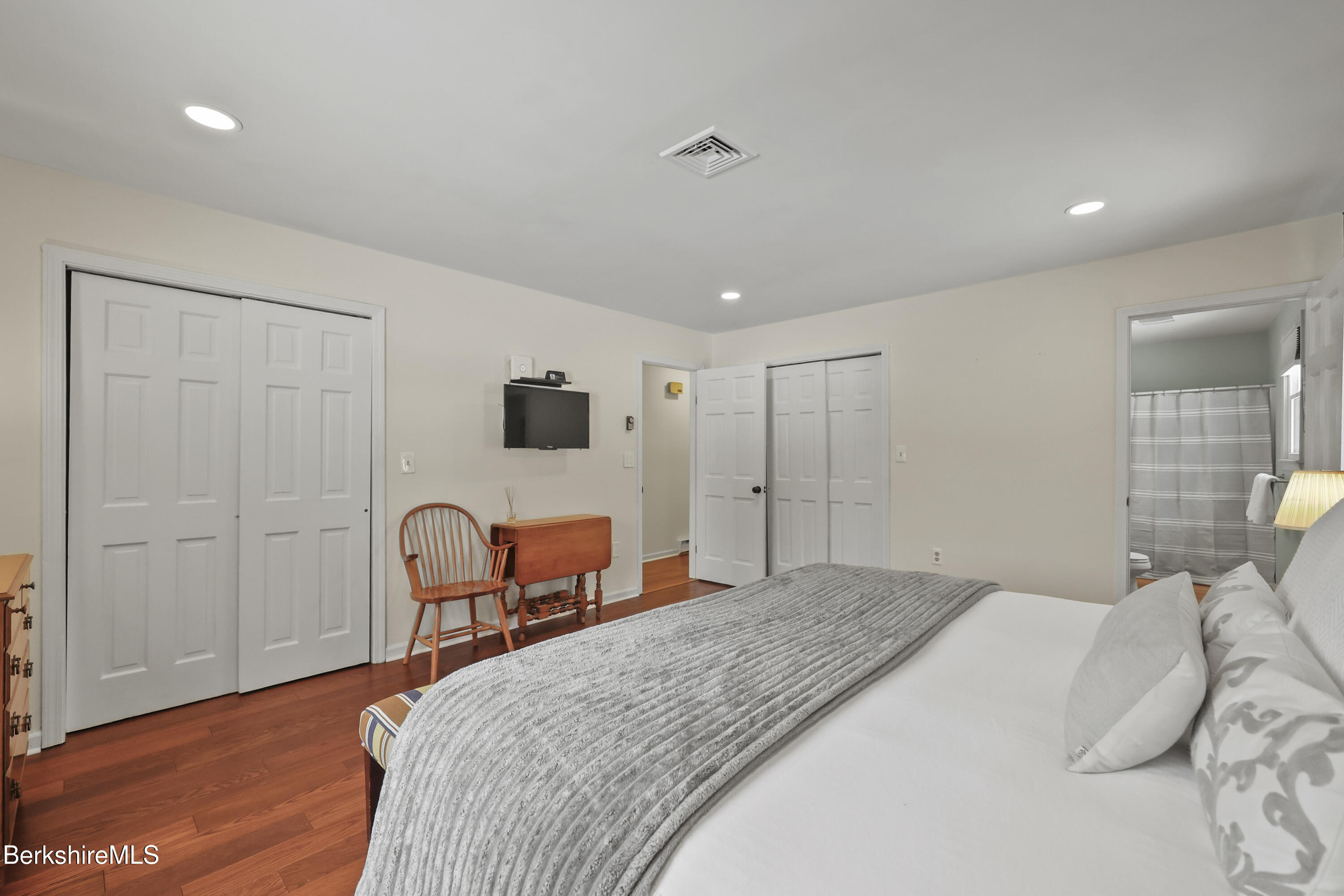 83 Alfred Drive Pittsfield, MA 01201 - Photo 20 of 49 a bedroom with a bed chair and dresser