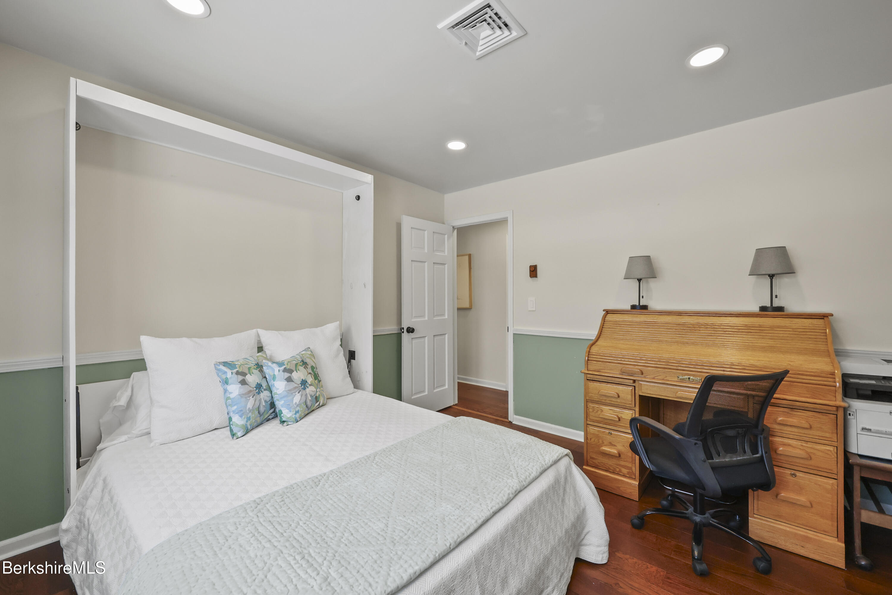 83 Alfred Drive Pittsfield, MA 01201 - Photo 27 of 49 a bedroom with a bed and a desk