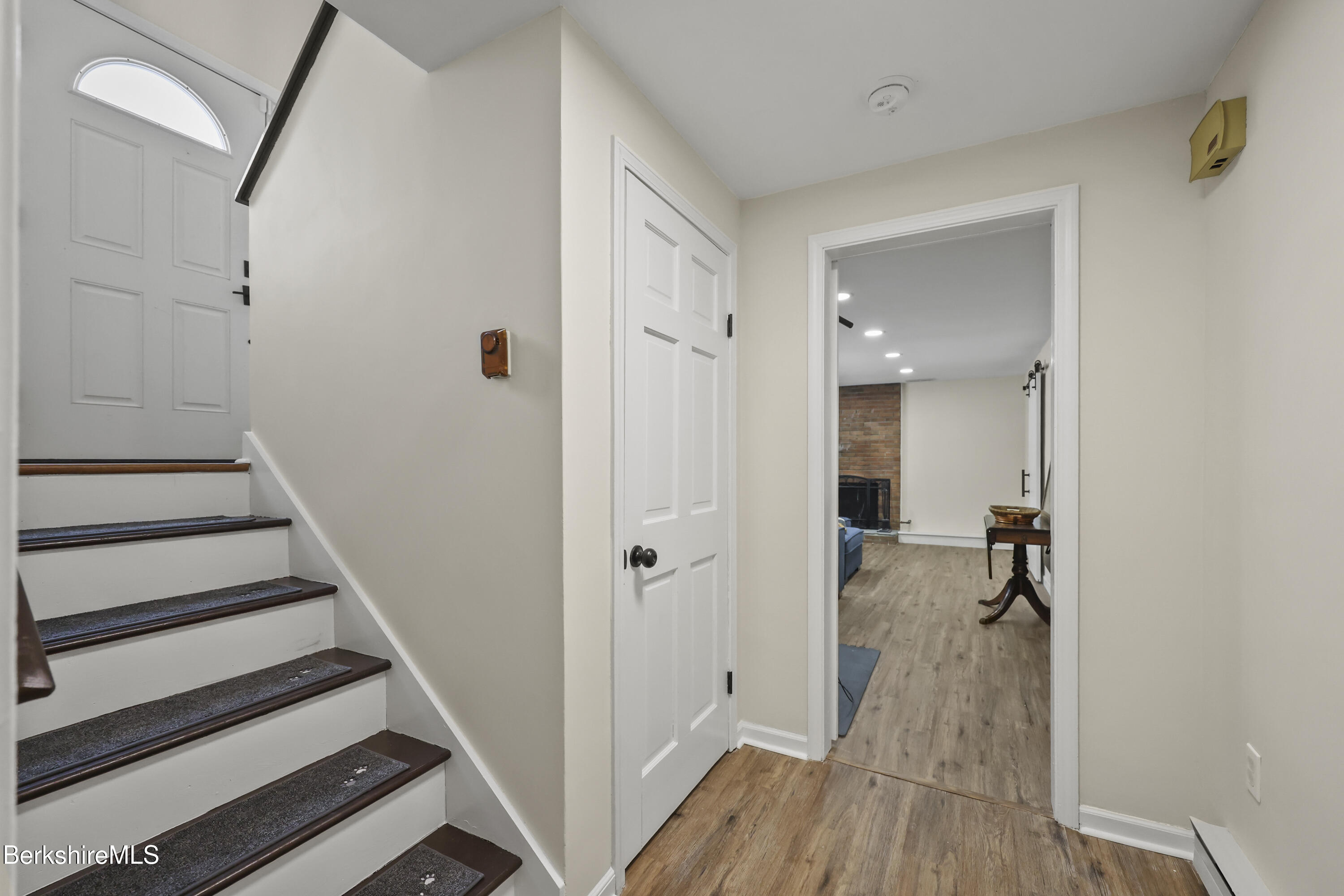 83 Alfred Drive Pittsfield, MA 01201 - Photo 29 of 49 a view of a hallway with wooden floor and staircase