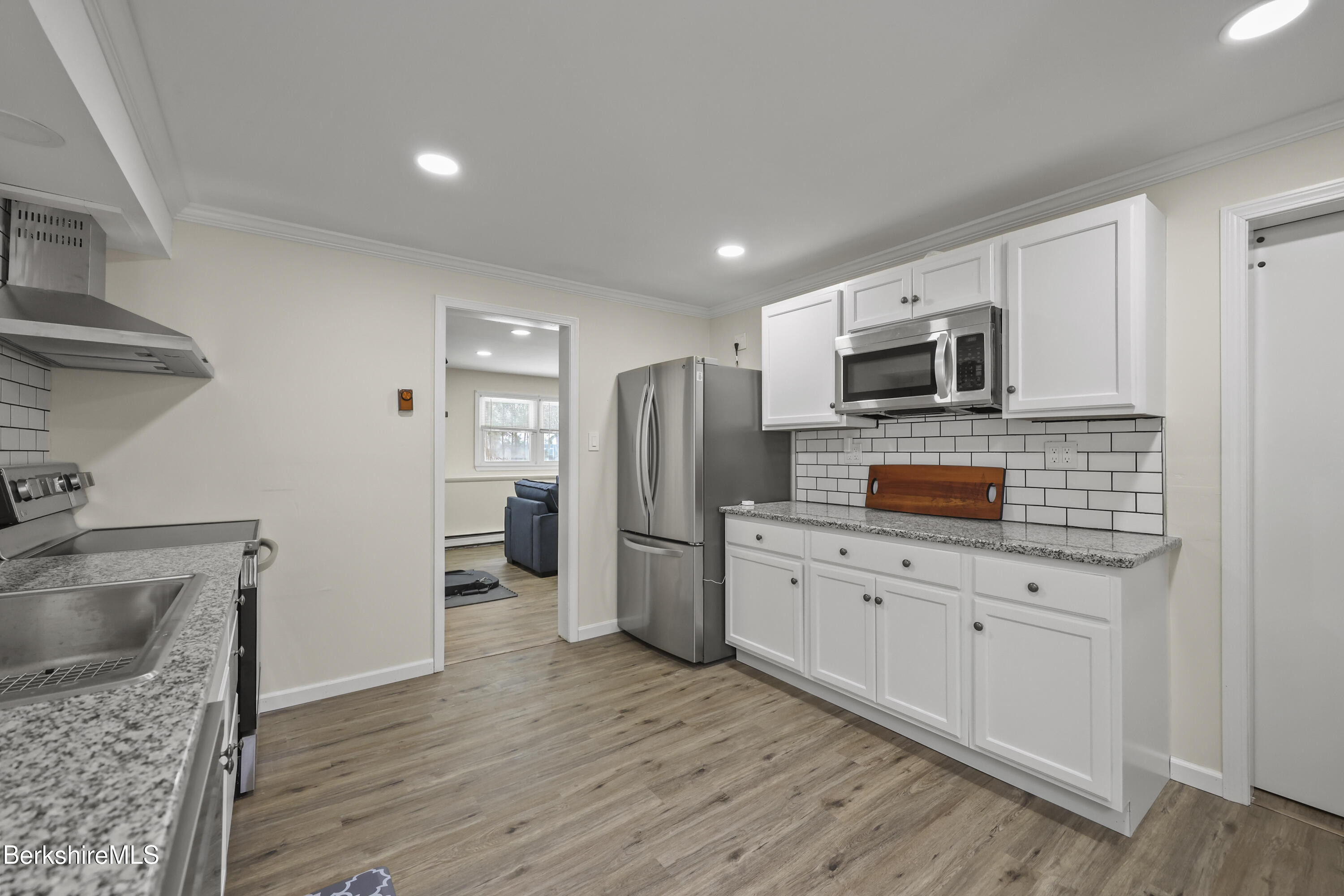 83 Alfred Drive Pittsfield, MA 01201 - Photo 38 of 49 a kitchen with granite countertop a refrigerator stove and sink
