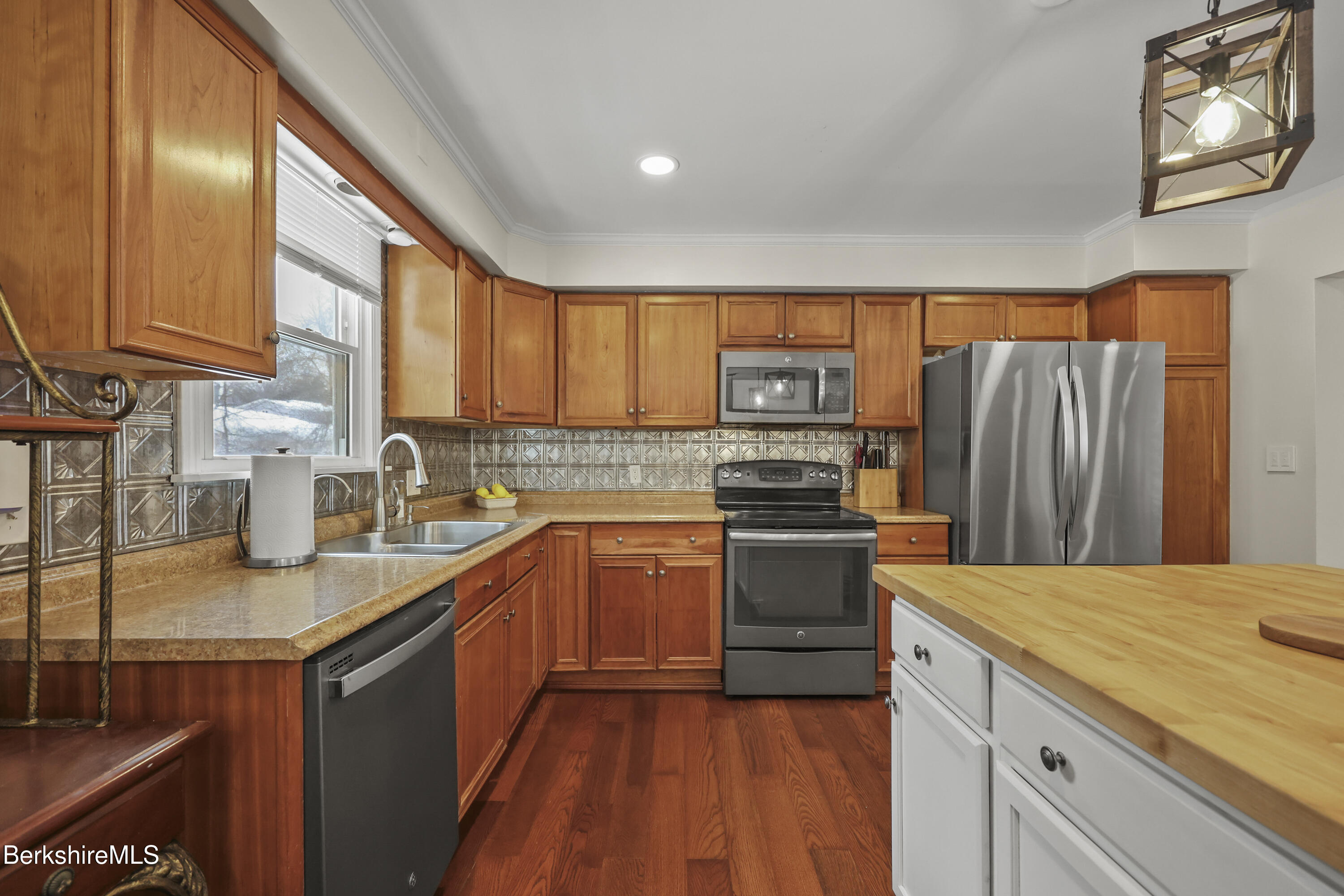 83 Alfred Drive Pittsfield, MA 01201 - Photo 10 of 49 a kitchen with stainless steel appliances granite countertop a sink dishwasher stove and refrigerator