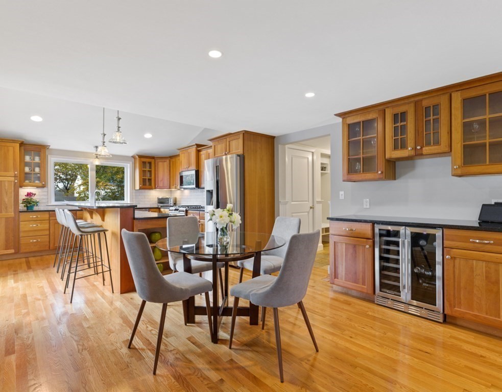 4 Park Street Lexington, MA 02421 - Photo 8 of 24 a view of a dining room with furniture and wooden floor