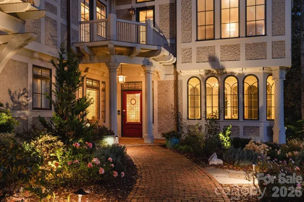 a view of a entryway door front of a house