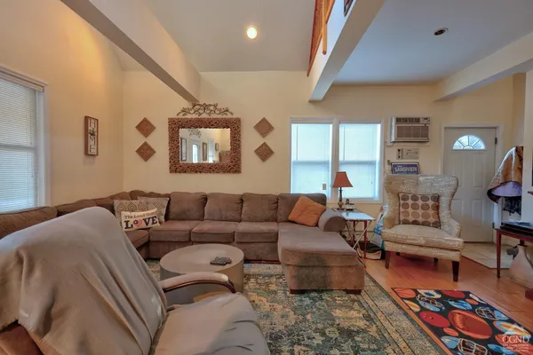 a bedroom with a bed and a table in it