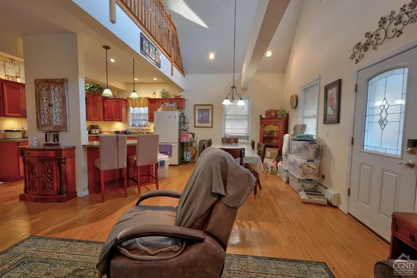 a bathroom with a toilet a sink and a mirror