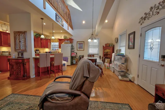 a view of a field with an houses
