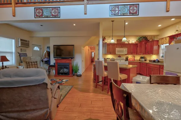 a white toilet sitting next to a bathroom sink