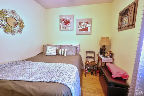 an aerial view of residential house with outdoor space and swimming pool