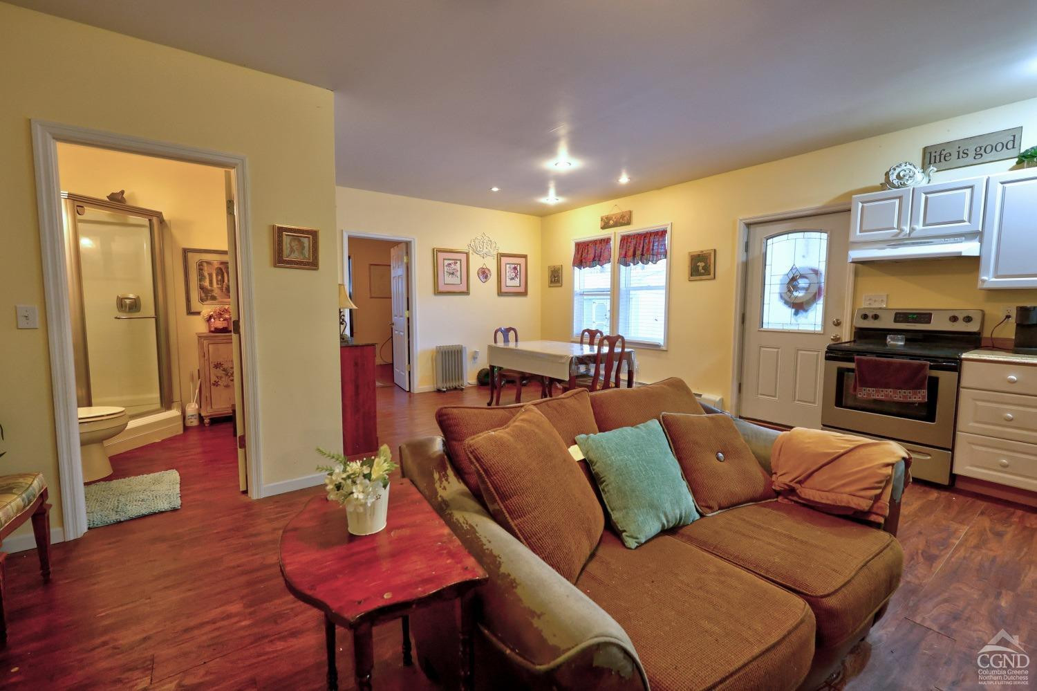 49 County Rte 39 Cairo, NY 12473 - Photo 58 of 114 a living room with furniture and a wooden floor