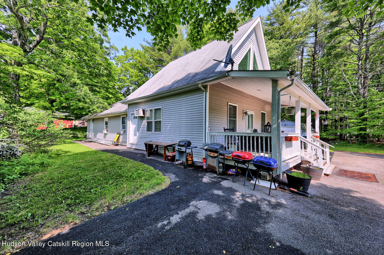 49 County Rte 39 Cairo, NY 12473 - Photo 6 of 114 a view of a house with backyard and sitting area