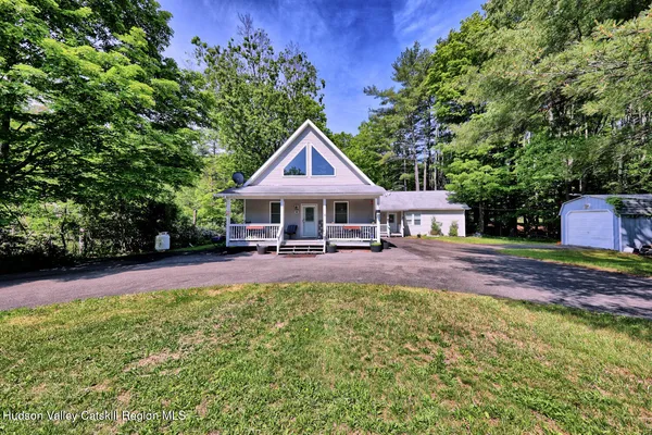 a view of a back yard of the house