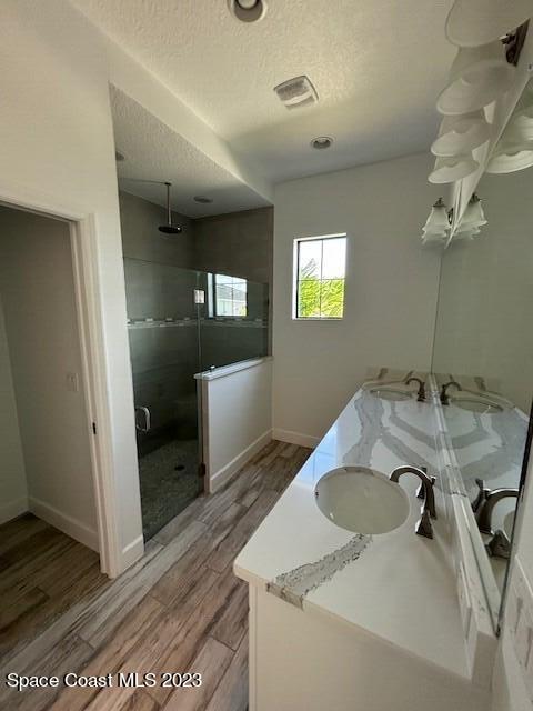 8326 Lyside Drive Melbourne, FL 32940 - Photo 9 of 17 a bathroom with a sink and mirror