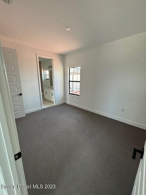 8326 Lyside Drive Melbourne, FL 32940 - Photo 12 of 17 an empty room with windows