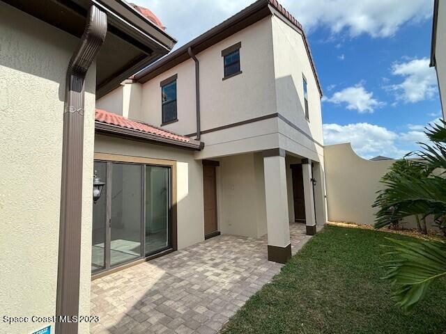 8326 Lyside Drive Melbourne, FL 32940 - Photo 15 of 17 a view of a house with a yard
